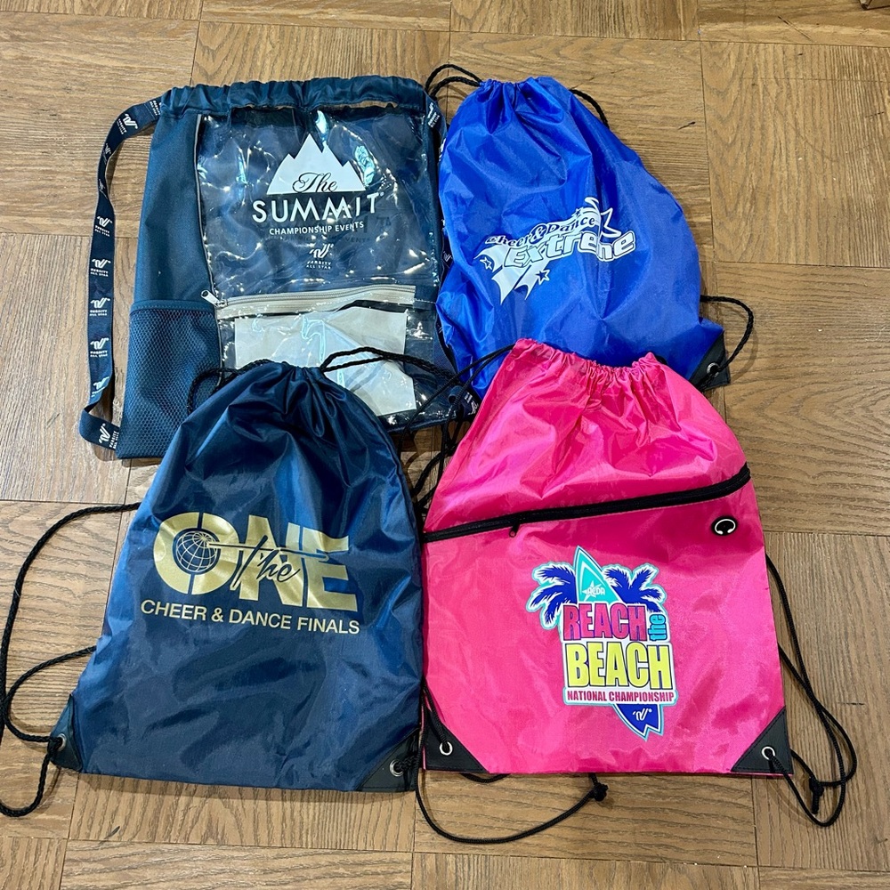 4 Pack Excellent Condition Drawstring Cheer Bags with Logos